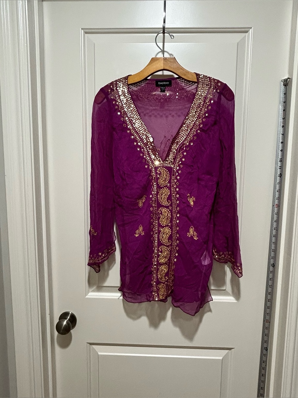 Bebe women’s size L Purple Sheer Embellished Tunic with Gold Accents. Like new
